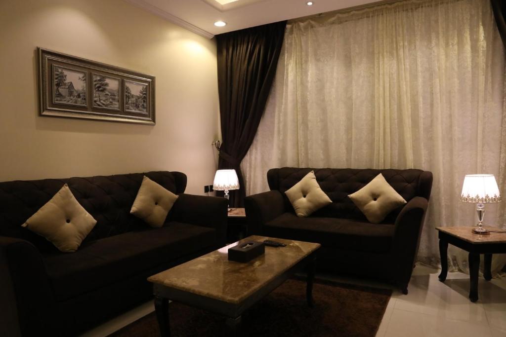 Posezení v ubytování Al Mokhtar 2 Furnished Units