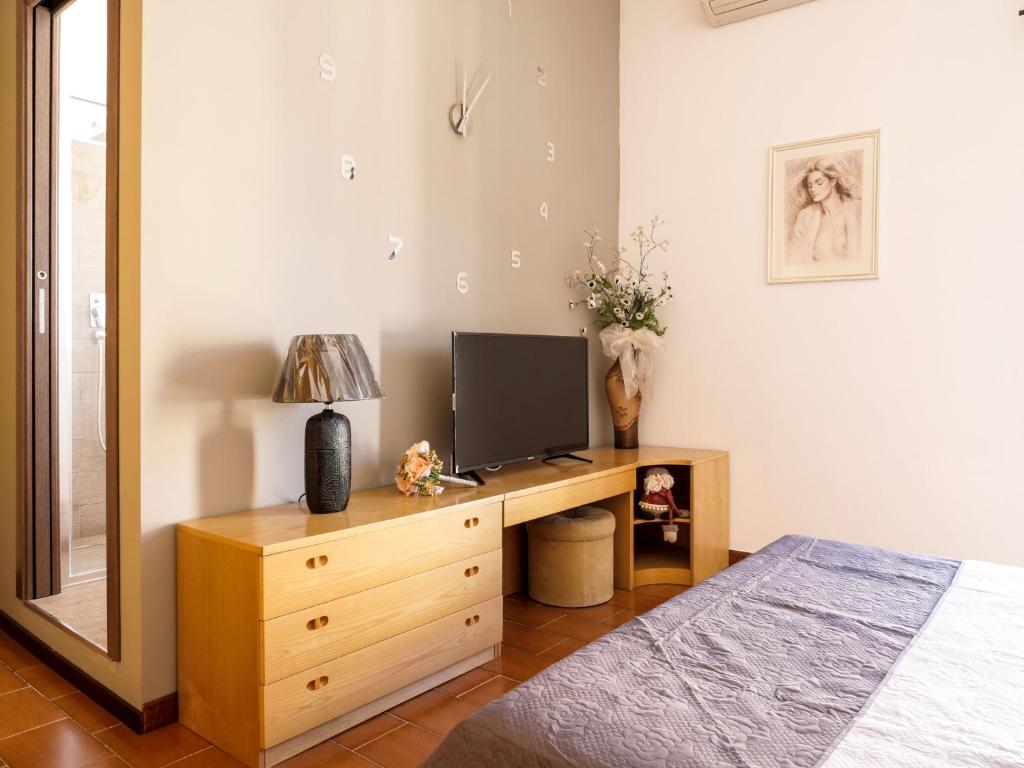 Posteľ alebo postele v izbe v ubytovaní B&B Laura