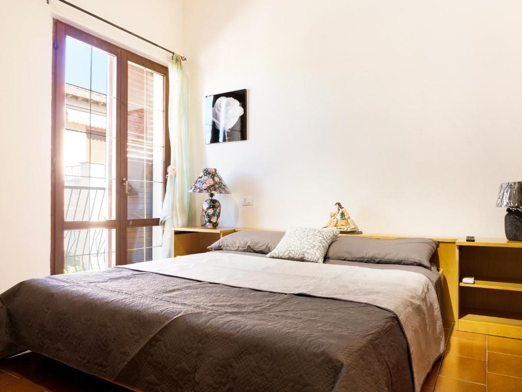 Posteľ alebo postele v izbe v ubytovaní B&B Laura