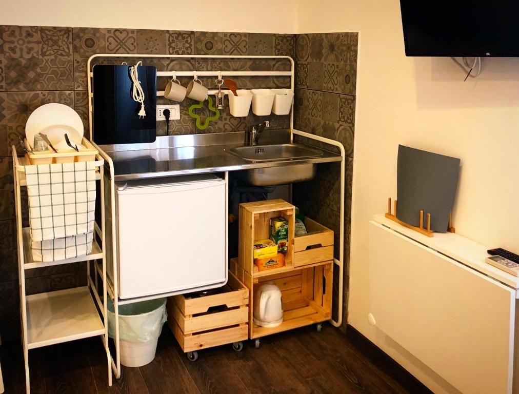 Kuchyňa alebo kuchynka v ubytovaní Mimì Rooms&Studios