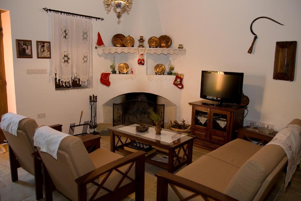 Posezení v ubytování Xenios Cottages
