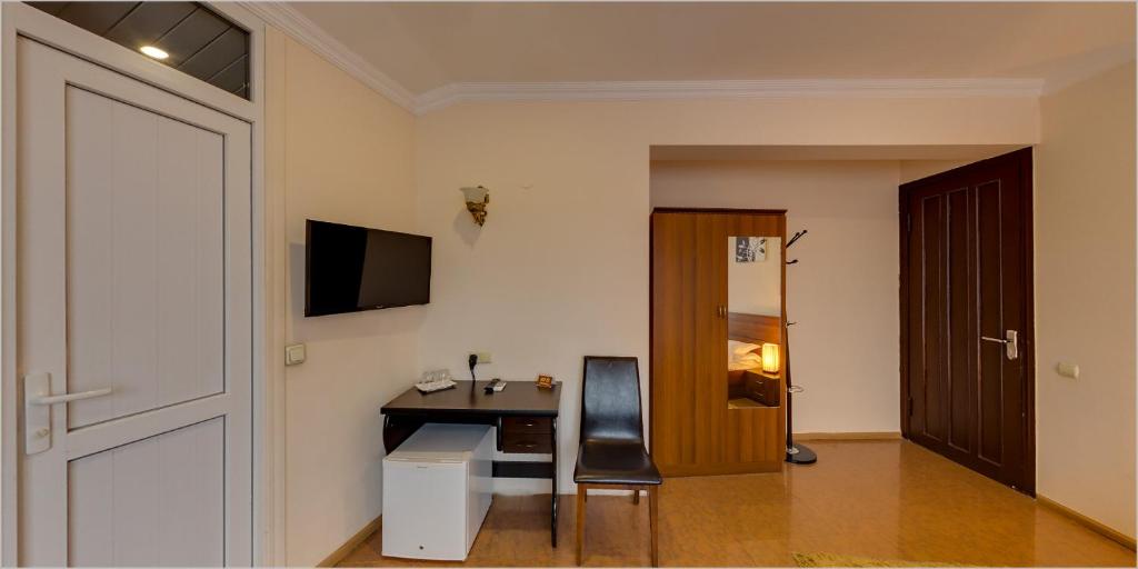 TV a/nebo společenská místnost v ubytování Hotel Avlabari