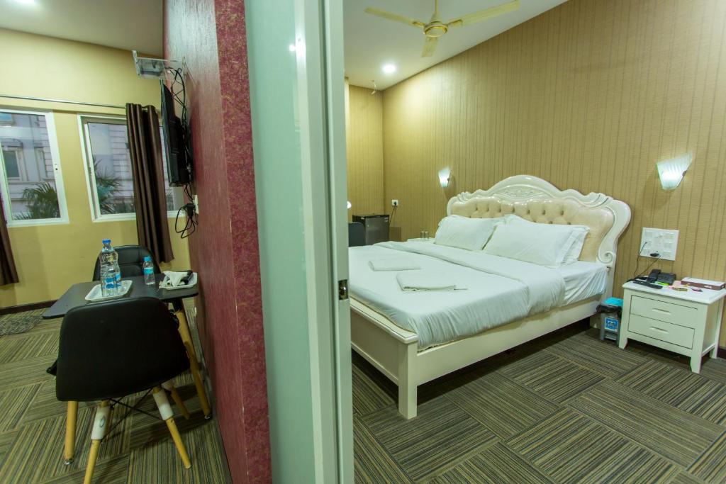 Postel nebo postele na pokoji v ubytování HOTEL PARK VICTORIA