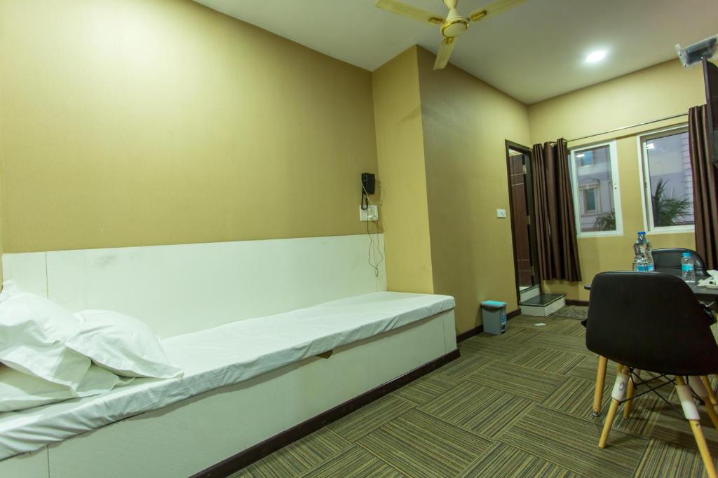 Postel nebo postele na pokoji v ubytování HOTEL PARK VICTORIA