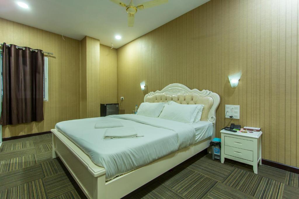 Postel nebo postele na pokoji v ubytování HOTEL PARK VICTORIA