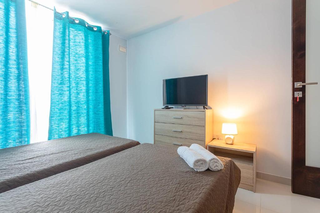 Postel nebo postele na pokoji v ubytování Belvedere Airport Suites