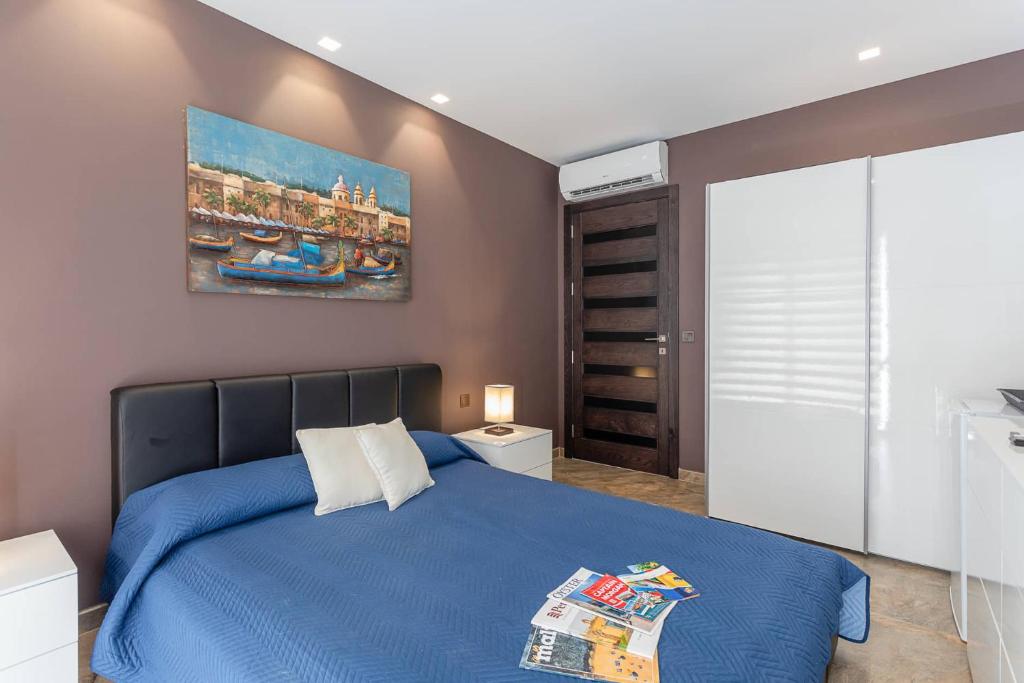 Postel nebo postele na pokoji v ubytování Belvedere Airport Suites