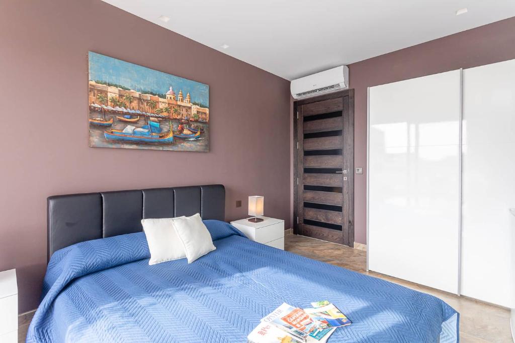 Postel nebo postele na pokoji v ubytování Belvedere Airport Suites
