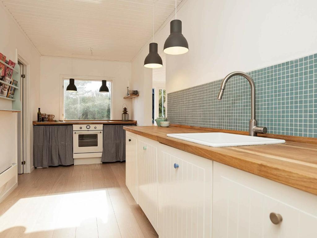 Kuchyň nebo kuchyňský kout v ubytování Charming Beach House - By Traum Ferienwohnungen