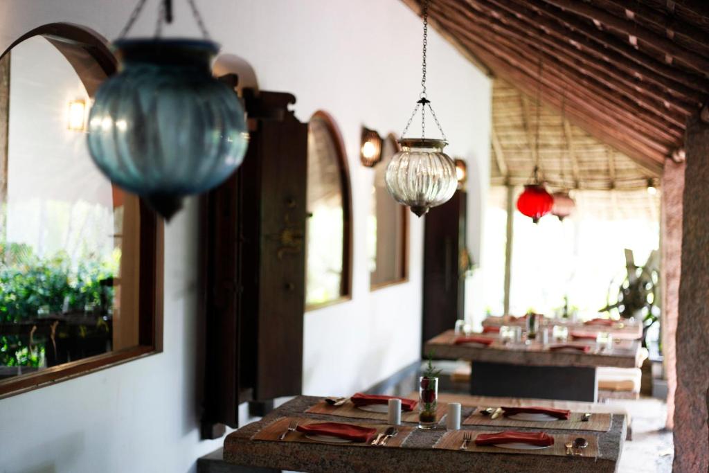 Restaurace v ubytování Amritara Shalimar Spice Garden Resort & Spa