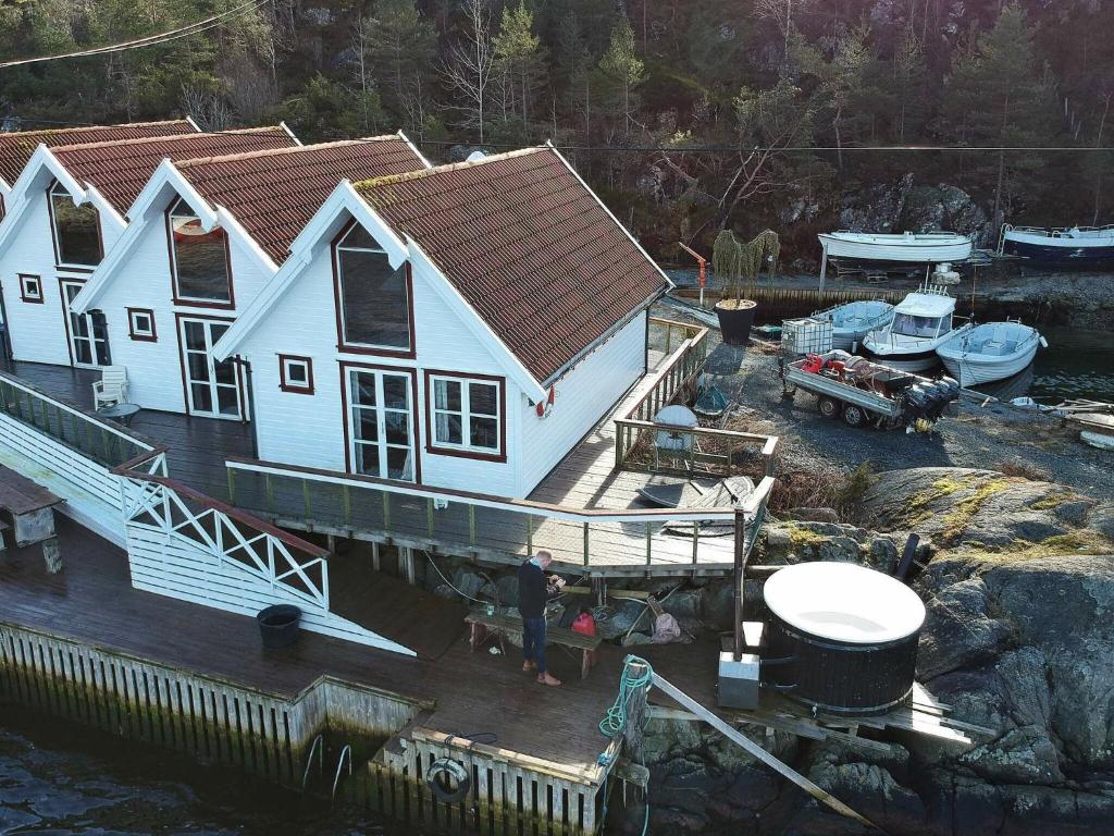 an aerial view of a house on a dock at Holiday home FOLDRØYHAMN in Foldrøyhamn