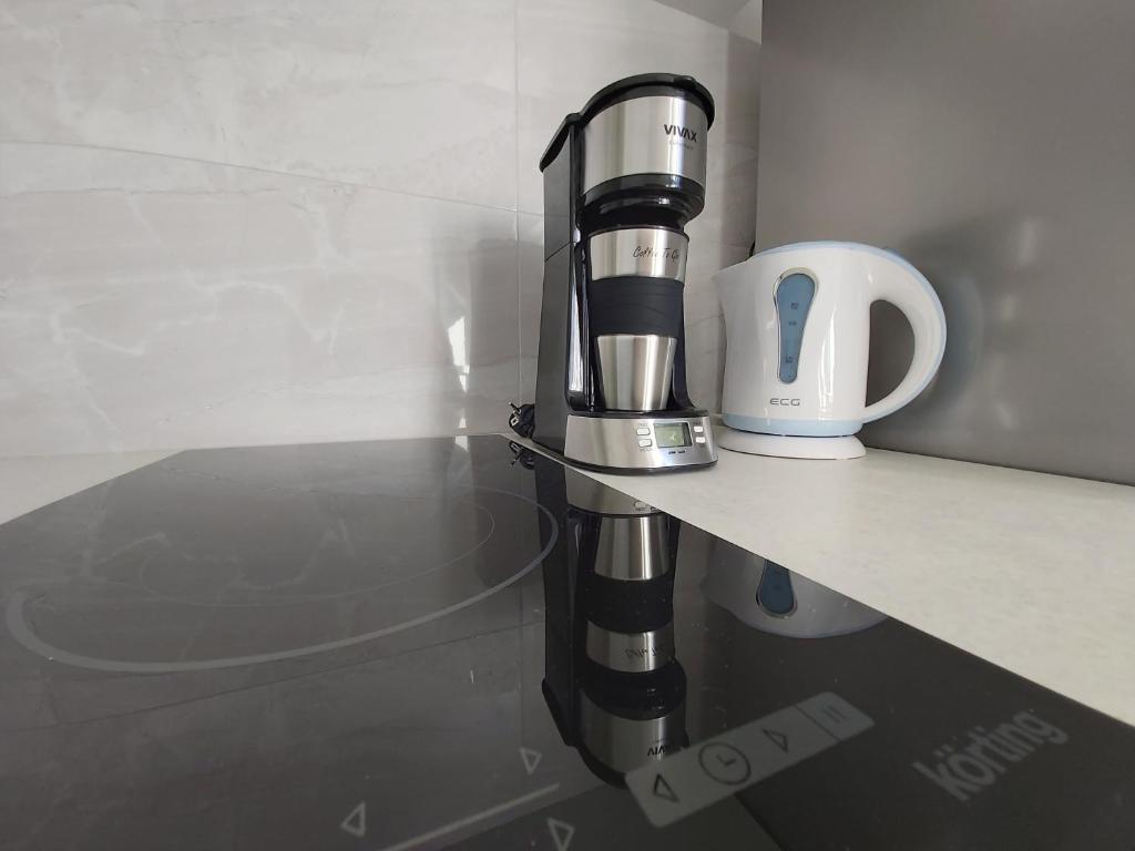 Príslušenstvo na prípravu kávy alebo čaju v ubytovaní Apartment Seaside Mireja