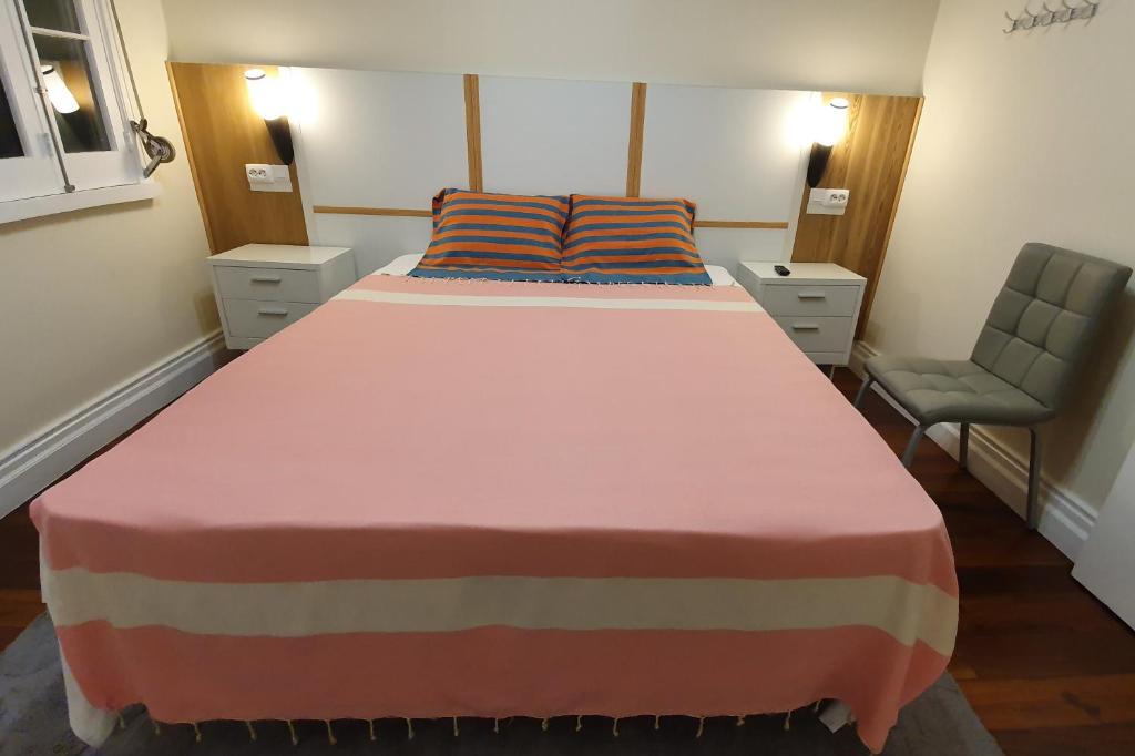 Postel nebo postele na pokoji v ubytování BRUMA HOSTEL