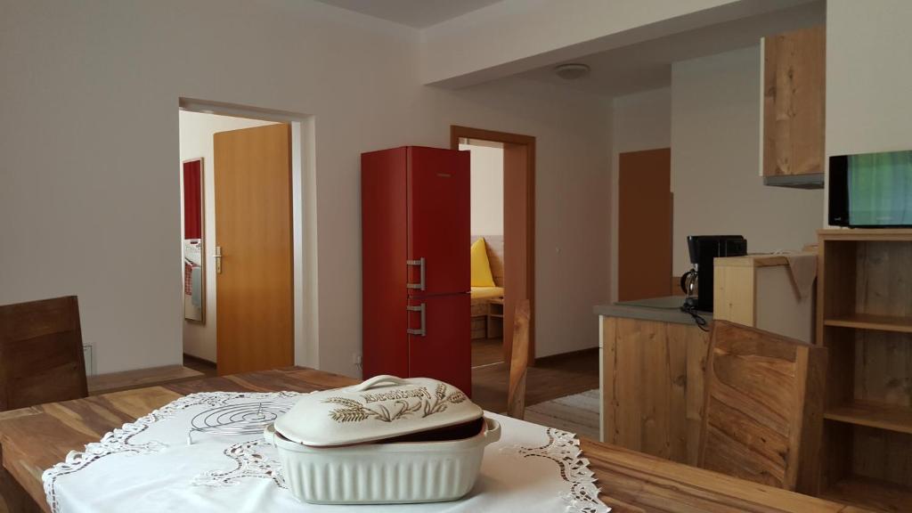 Televízia a/alebo spoločenská miestnosť v ubytovaní Appartement Juns