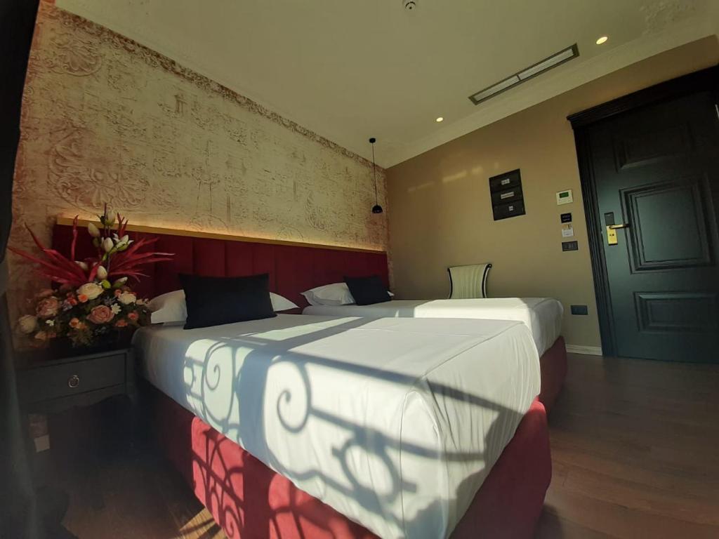 Postel nebo postele na pokoji v ubytování Hotel Kloest