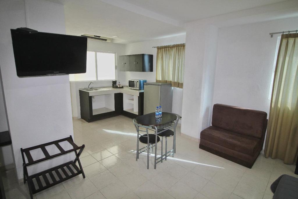 Kuchyň nebo kuchyňský kout v ubytování EMS Hoteles Boca del Río