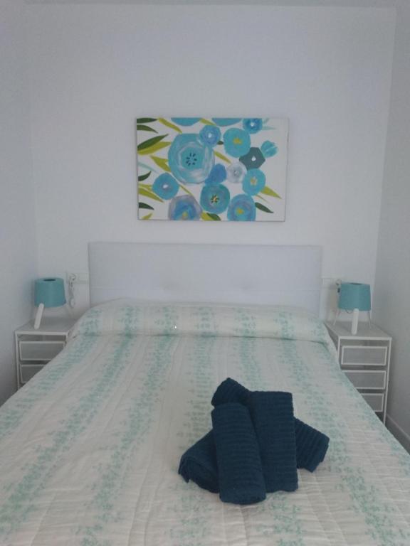 Postel nebo postele na pokoji v ubytování La casita de Evita