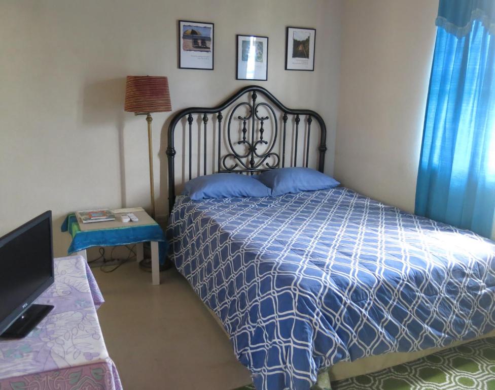 Postel nebo postele na pokoji v ubytování Gemini House Bed & Breakfast
