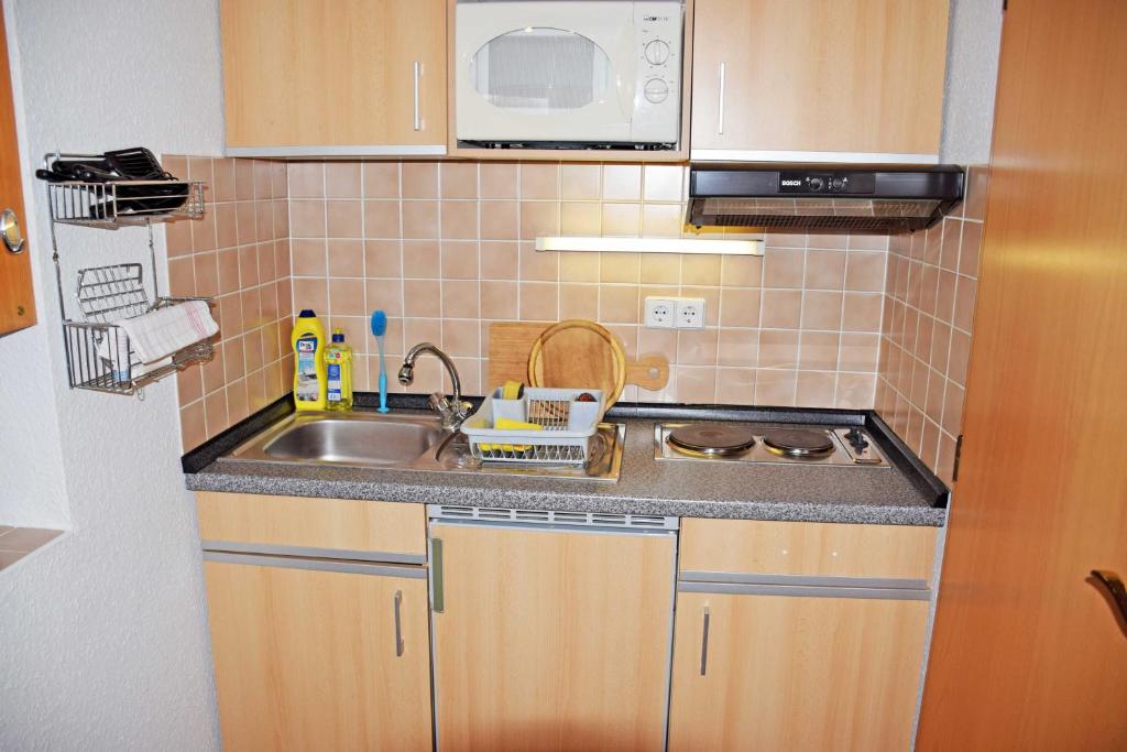 Kuchyň nebo kuchyňský kout v ubytování Ferienappartements in Gager auf Ru