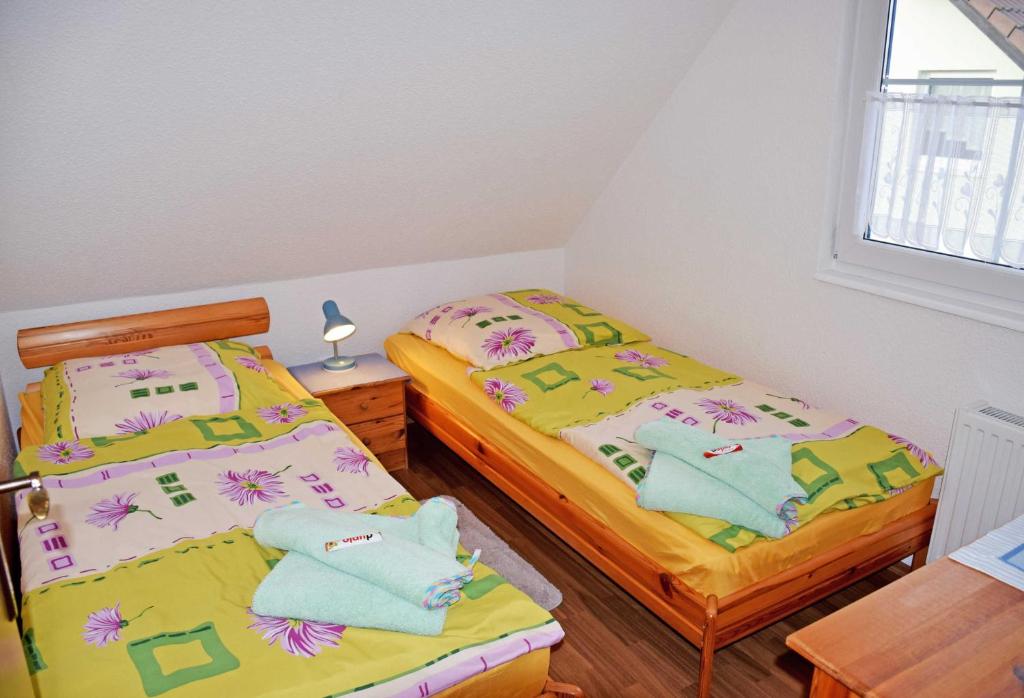 Postel nebo postele na pokoji v ubytování Ferienappartements in Gager auf Ru