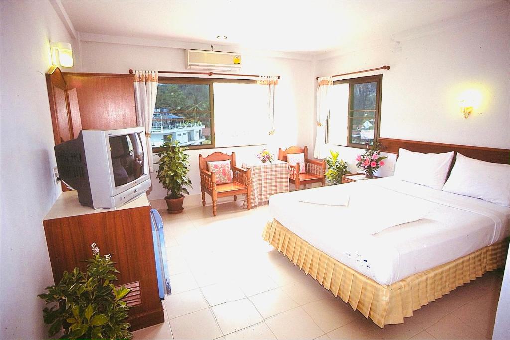Postel nebo postele na pokoji v ubytování J Mansion