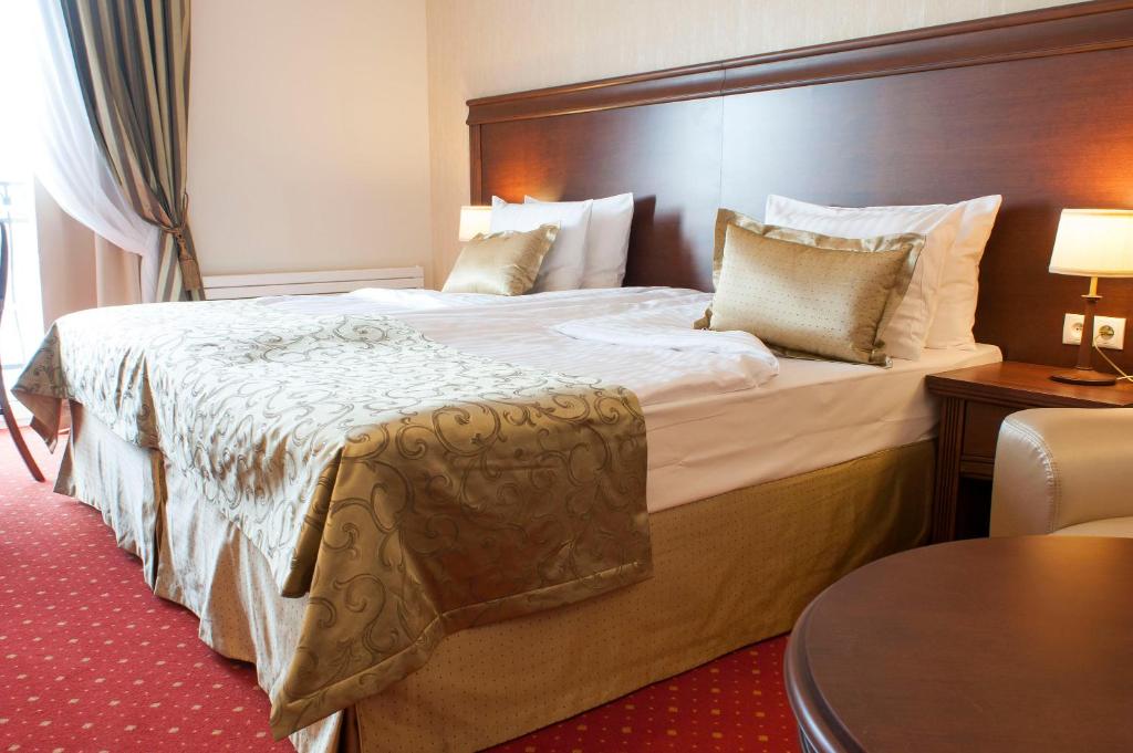 Postel nebo postele na pokoji v ubytování Hotel Splendor