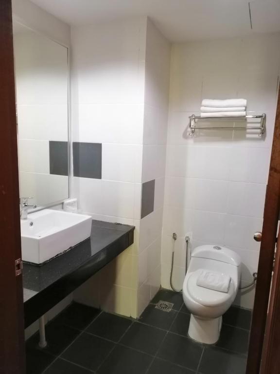 Koupelna v ubytování TD Mutiara Hotel Semporna