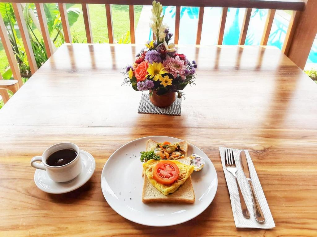 Omorich Bali Guest House - 11