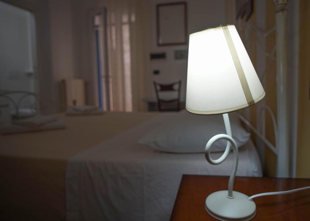 Posteľ alebo postele v izbe v ubytovaní B&B Le Terrazze