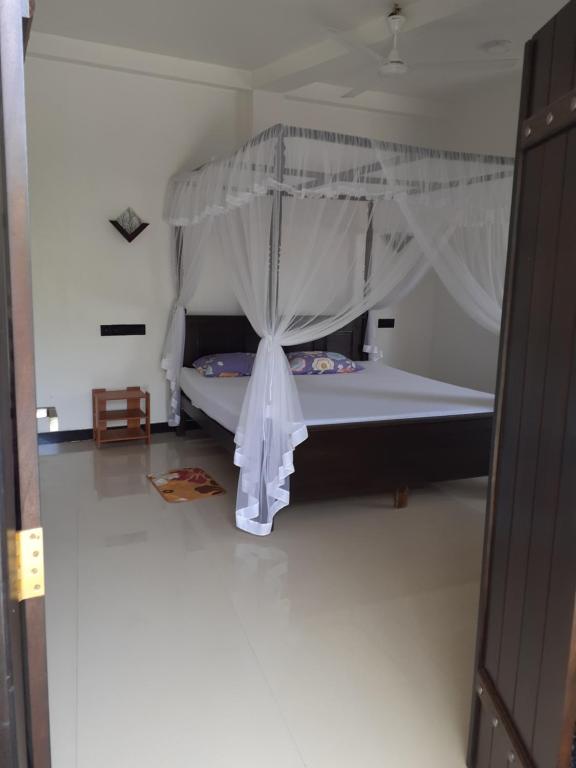 Postel nebo postele na pokoji v ubytování Bisandu guesthouse