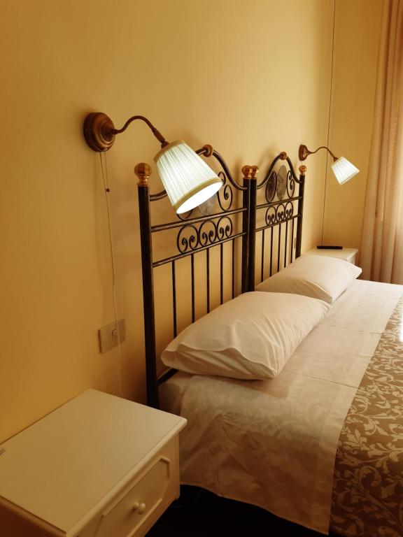 Ένα ή περισσότερα κρεβάτια σε δωμάτιο στο B&B Murgantia