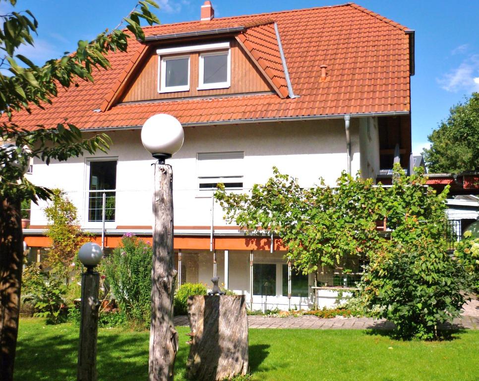 a house with a red roof at Haus am Sandsteinbruch in Zaberfeld