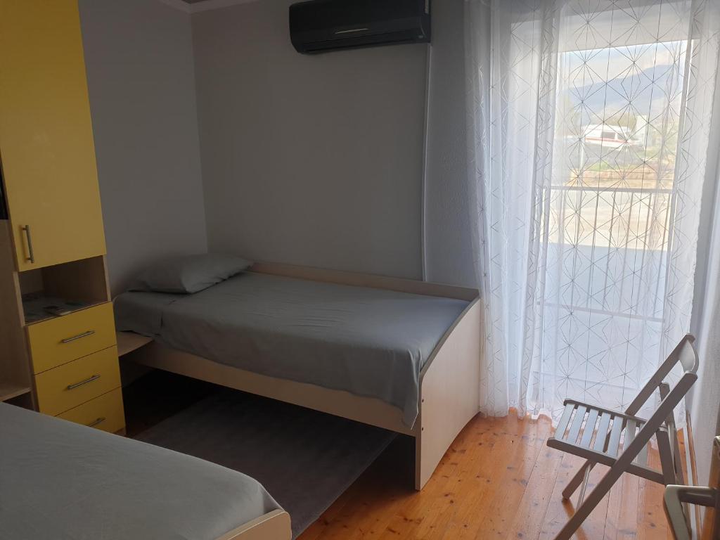 Postel nebo postele na pokoji v ubytování Villa Memories