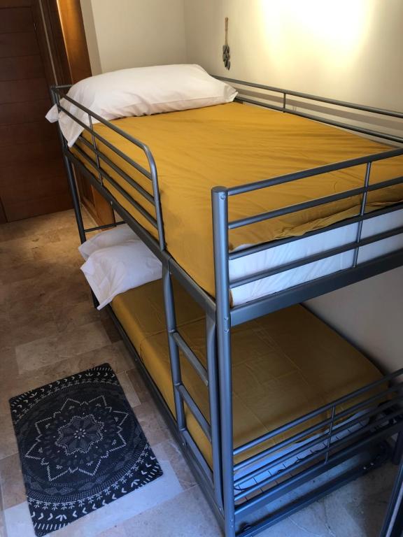 Postel nebo postele na pokoji v ubytování La Faroleta Puerto