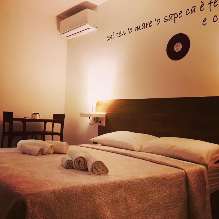 Posteľ alebo postele v izbe v ubytovaní B&B Allerìa Pozzuoli