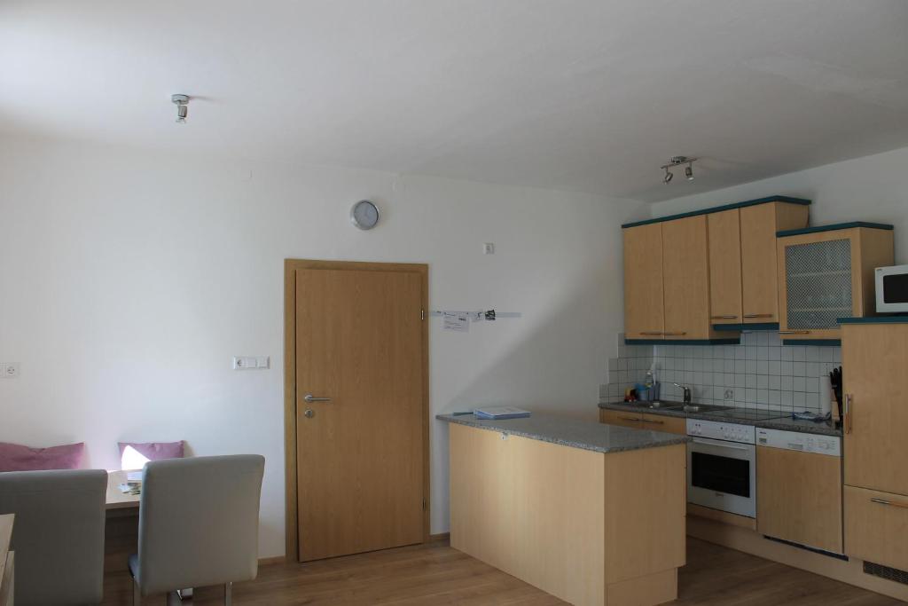 Kuchyň nebo kuchyňský kout v ubytování Ferienwohnung MINA - Rattendorf