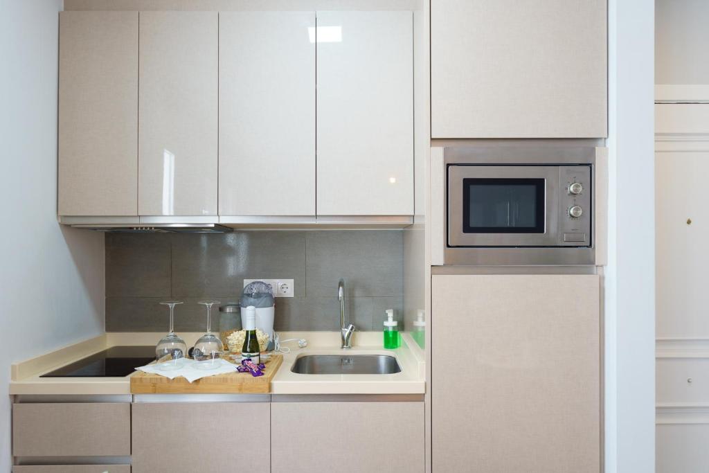 Kuchnia lub aneks kuchenny w obiekcie Apartamentos Circulo De Artistas