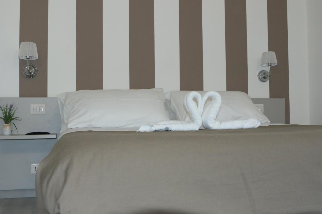 Postel nebo postele na pokoji v ubytování Il Canale Design House