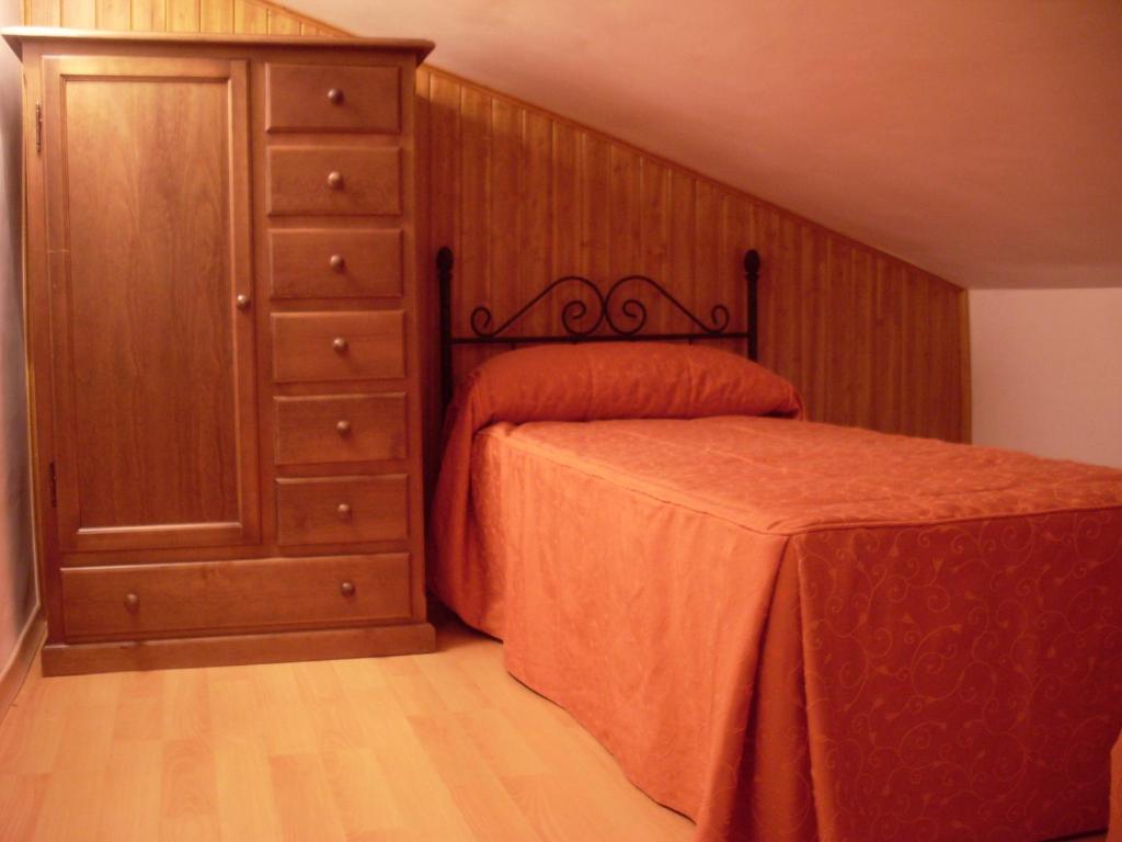 Łóżko lub łóżka w pokoju w obiekcie Casas Rurales Cortijos el Encinar