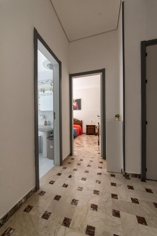 Posteľ alebo postele v izbe v ubytovaní Carlentini house B&B