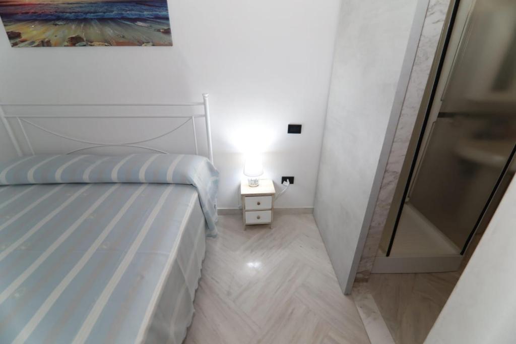 Posteľ alebo postele v izbe v ubytovaní B&B Annunziata