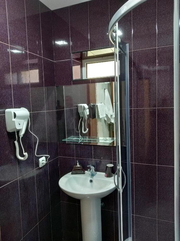 Koupelna v ubytování DownTown B&B