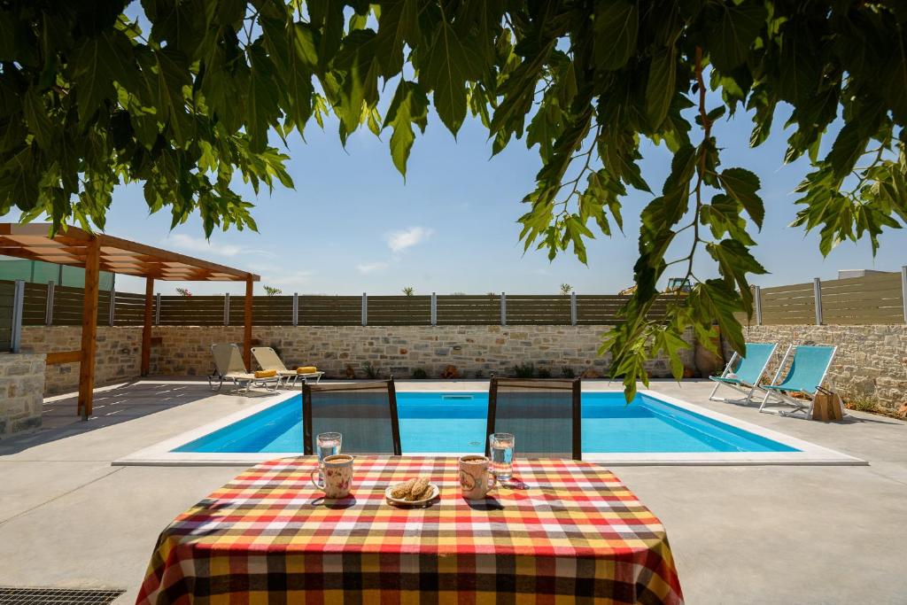 Piscine de l'établissement Orelia Cretan Villas - Private Pool ou située à proximité