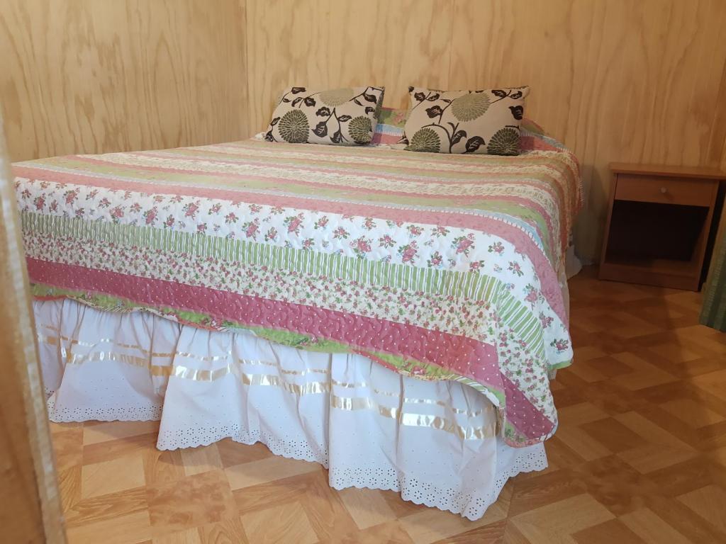 Postel nebo postele na pokoji v ubytování Departamento Hikari