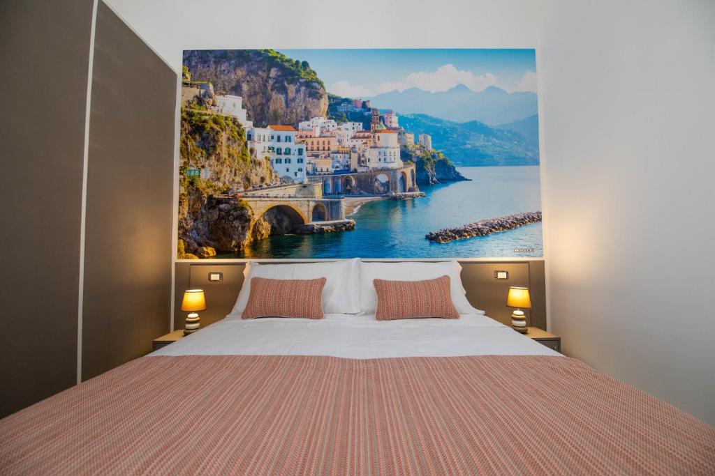 Posteľ alebo postele v izbe v ubytovaní Palazzo Caracciolo del Sole
