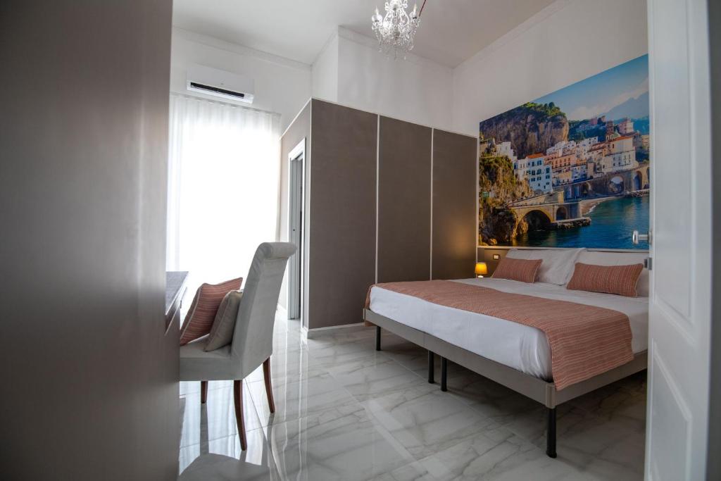Posteľ alebo postele v izbe v ubytovaní Palazzo Caracciolo del Sole