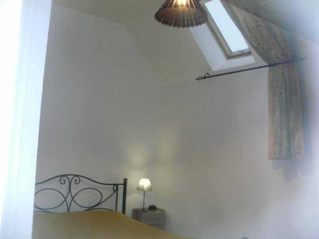 Postel nebo postele na pokoji v ubytování grange dans ancien corps de ferme
