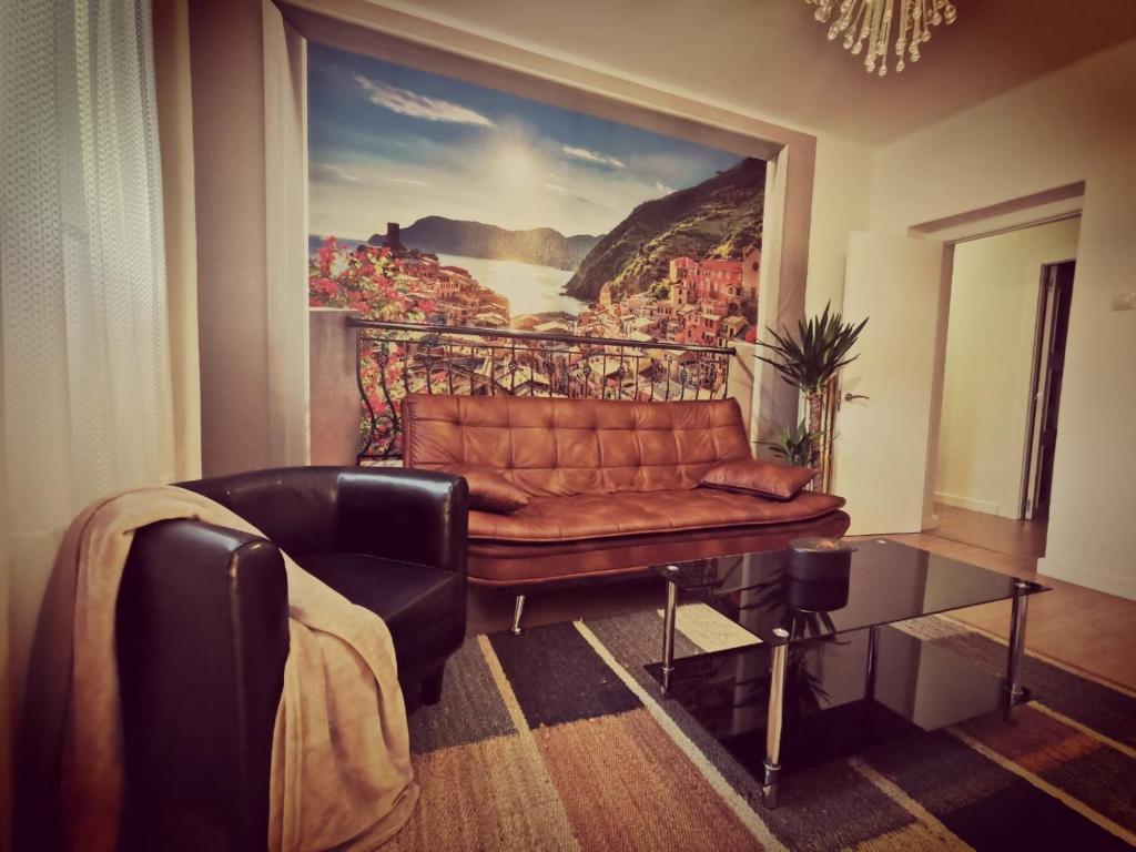 A seating area at Casa Coqueta y confortable en Oviedo