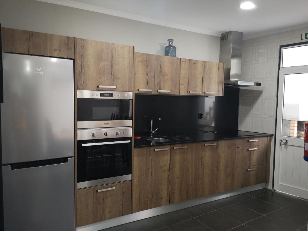 Kuchyň nebo kuchyňský kout v ubytování Bruma Home
