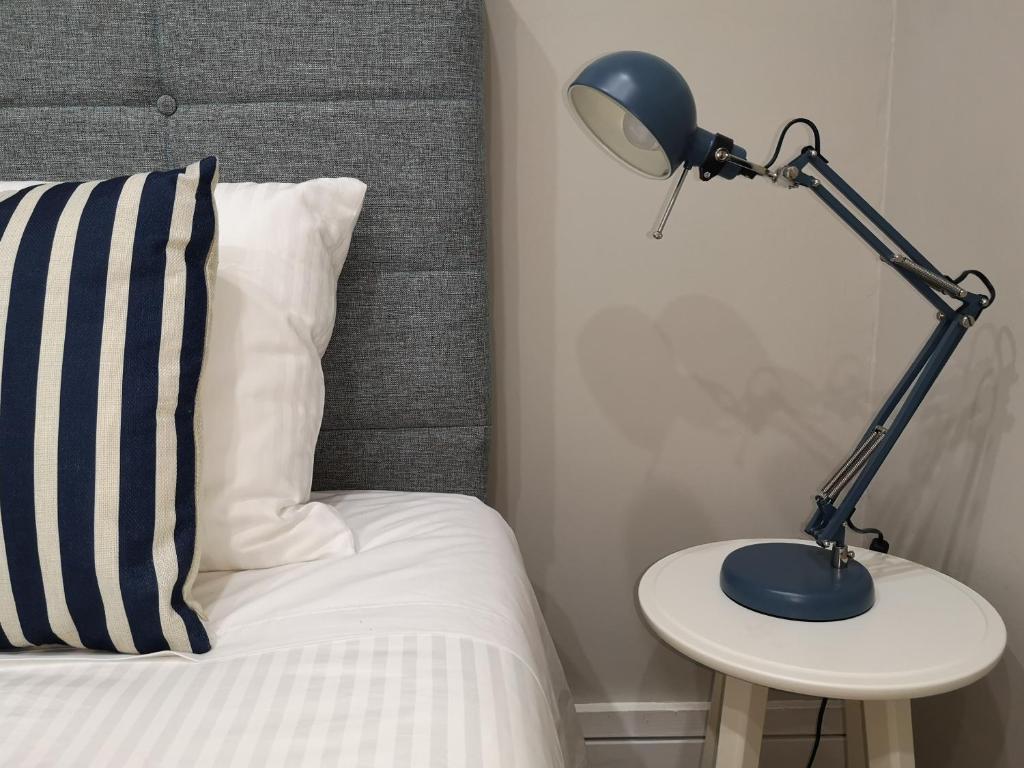 Postel nebo postele na pokoji v ubytování Bruma Home